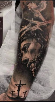 jesus arm sleeve tattoo