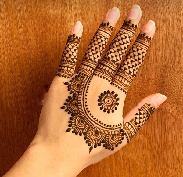 mehndi design behind hand