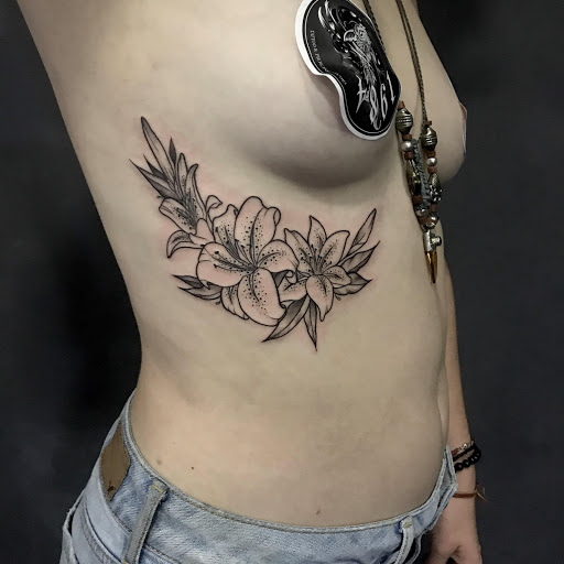 female tattoo chest