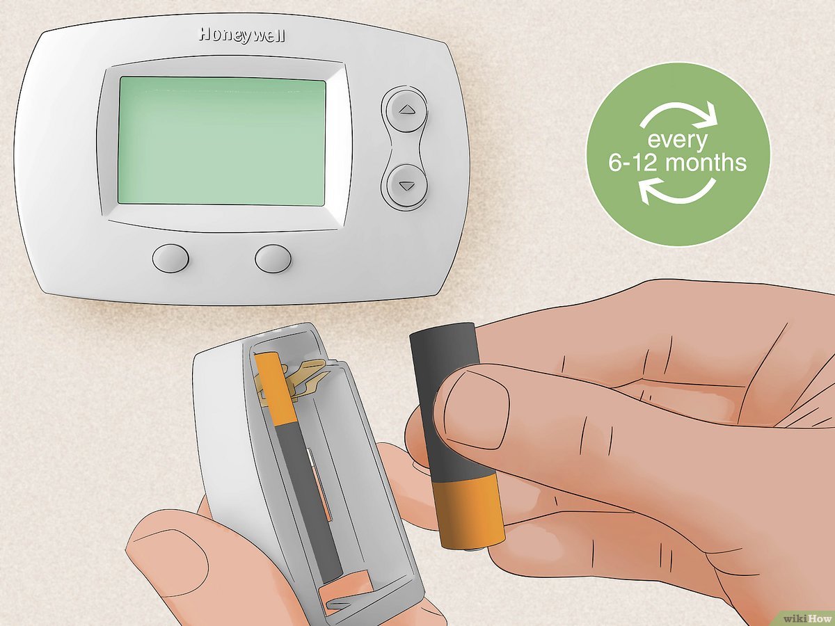 how to change battery on honeywell thermostat