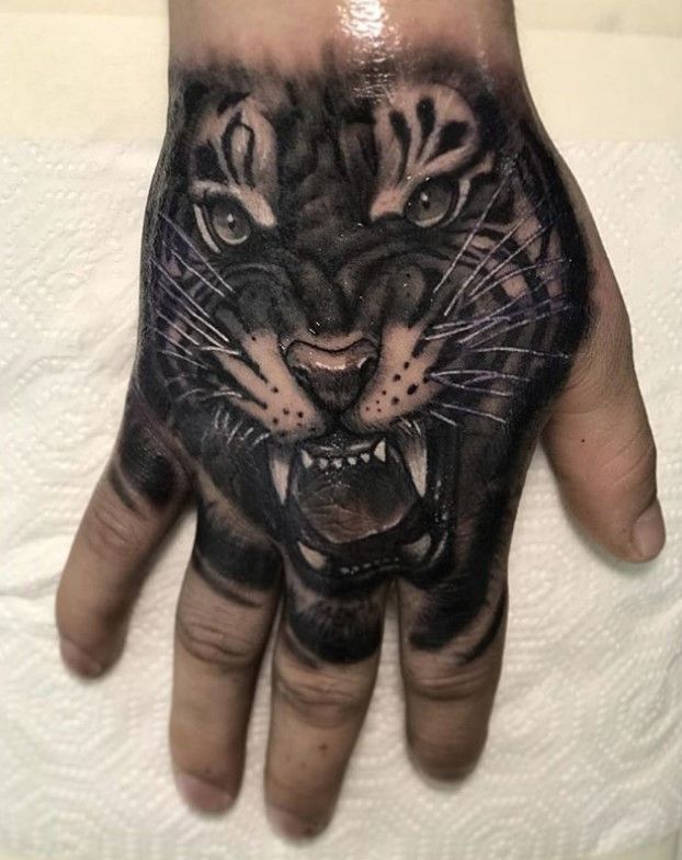 tiger hand tattoos