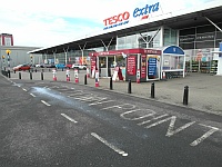 tesco st rollox opening times