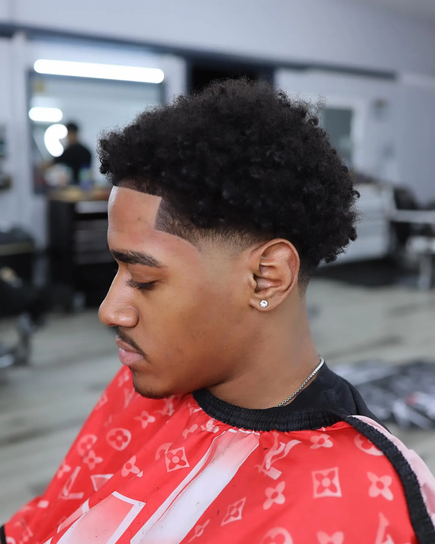 taper fade curly hair black