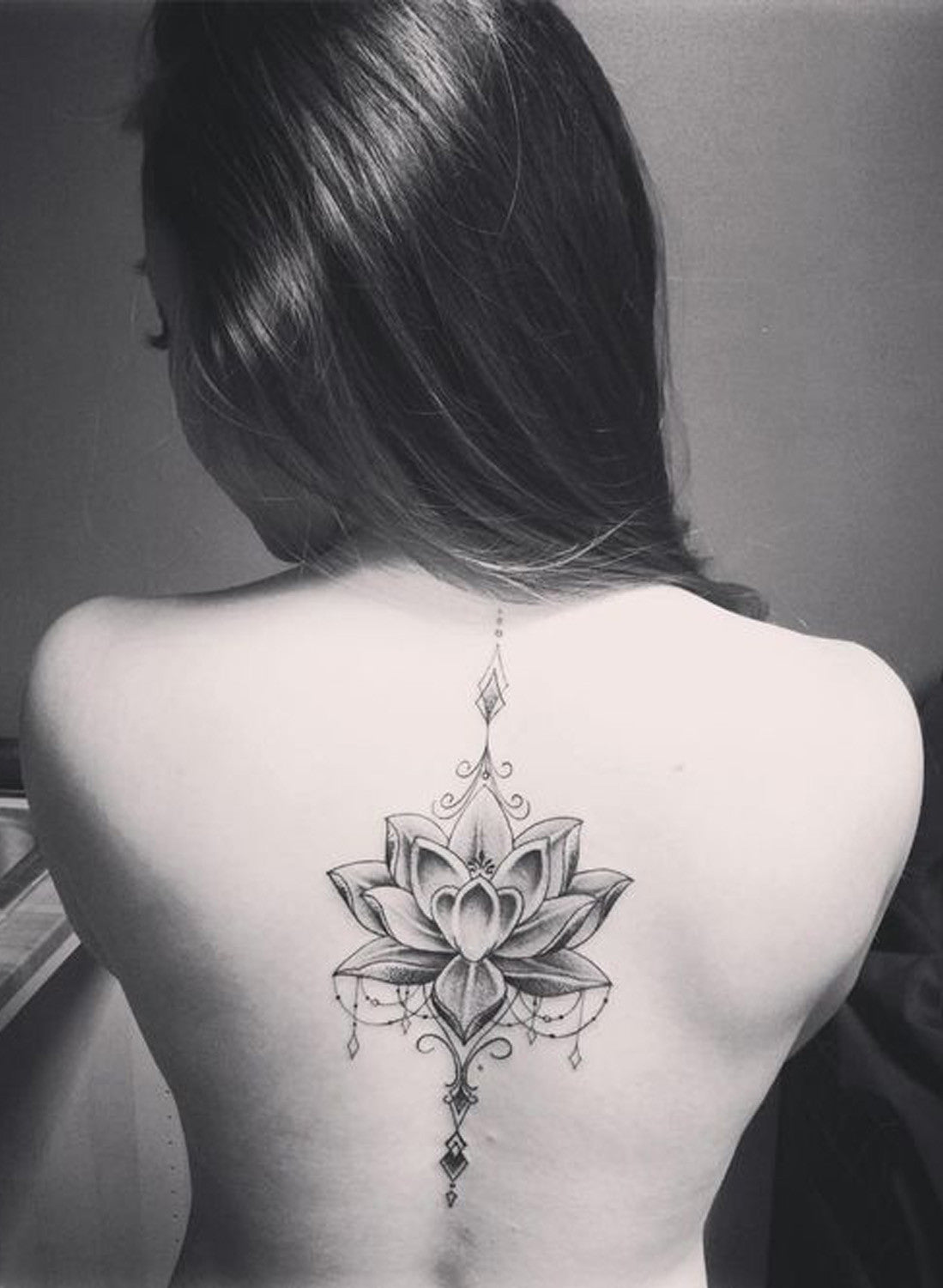 lotus back tattoo