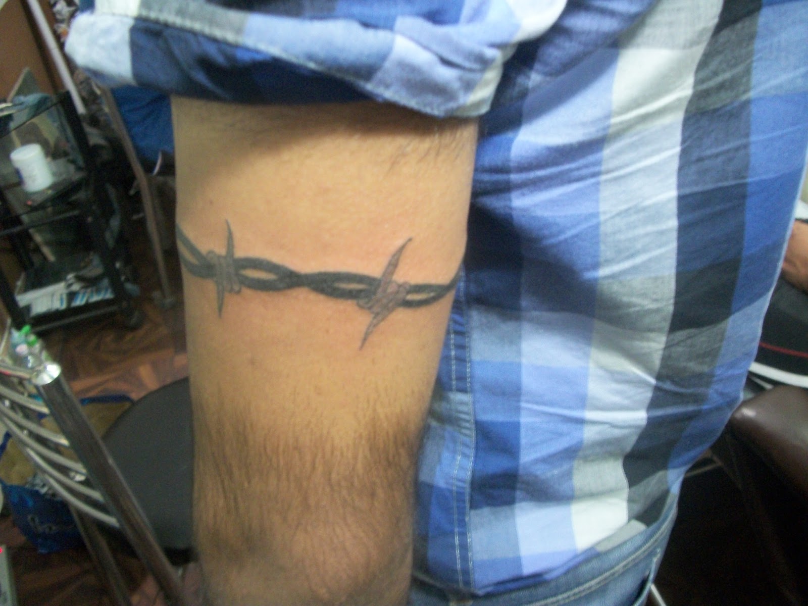 barbed wire tattoo meaning