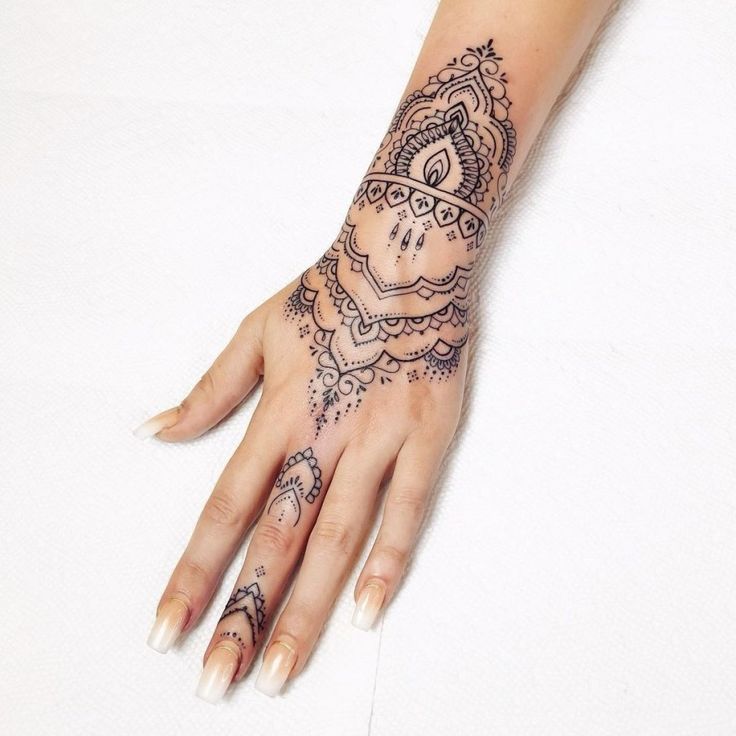 hand mandala tattoos