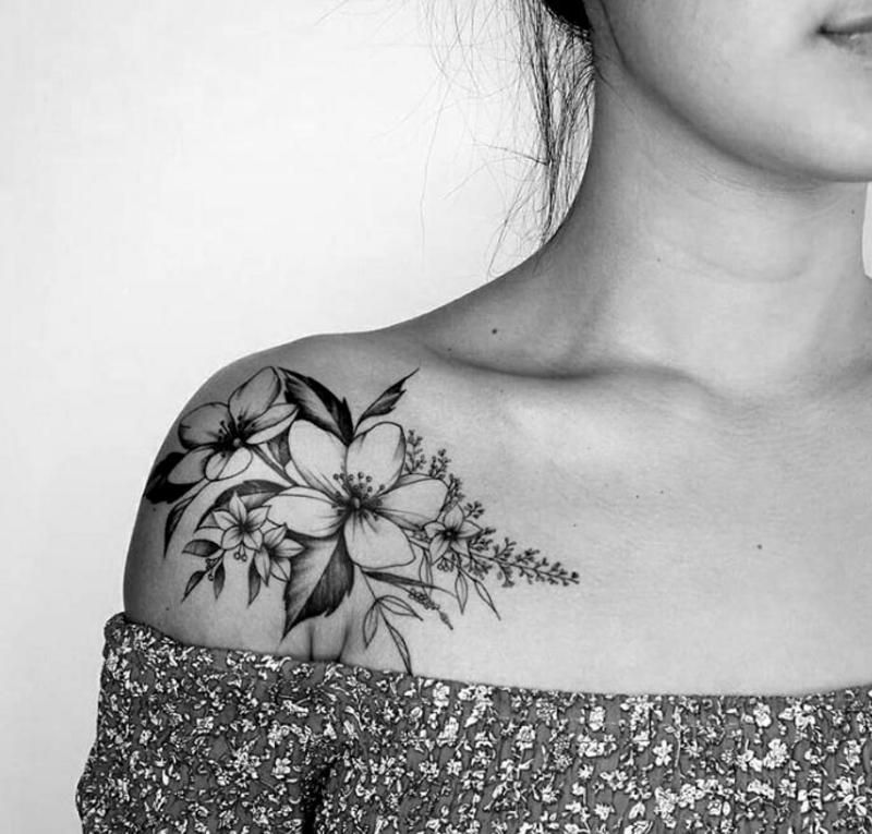 black white flower tattoo