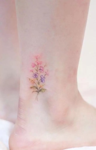 small watercolor flower tattoo