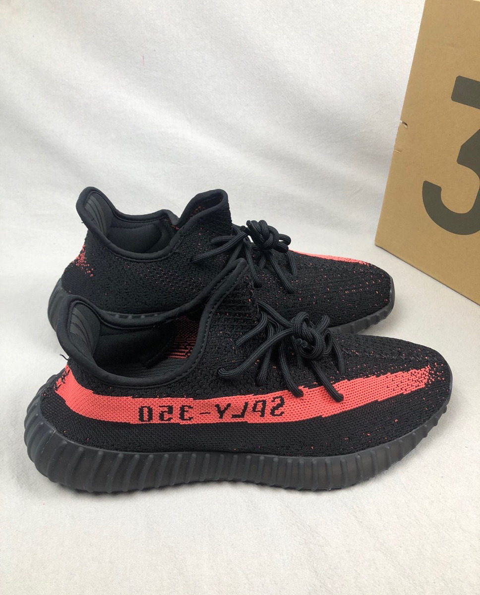 yeezy black with red stripe