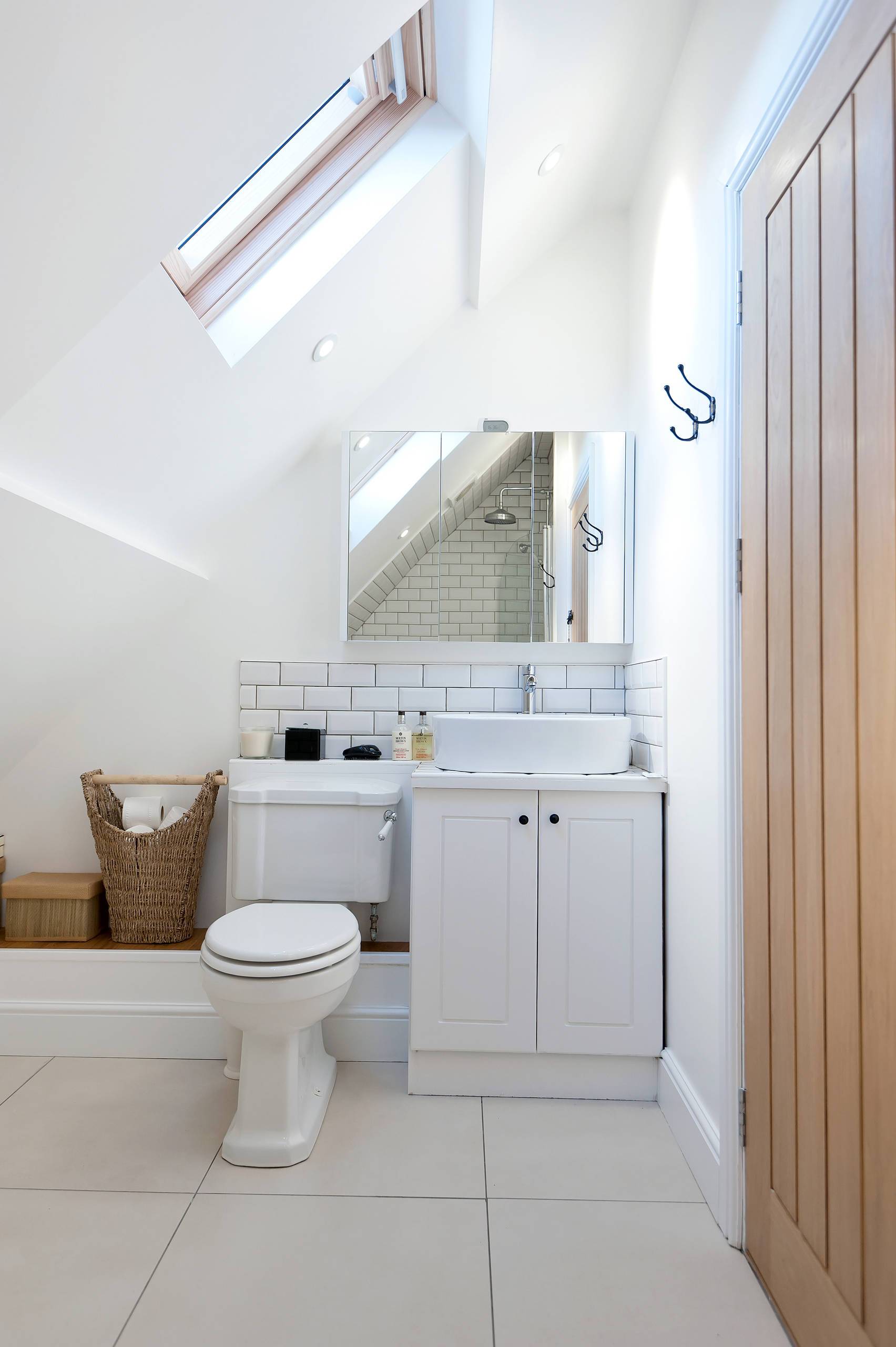 small attic bathroom sloped ceiling