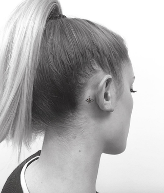 small tattoo behind ear