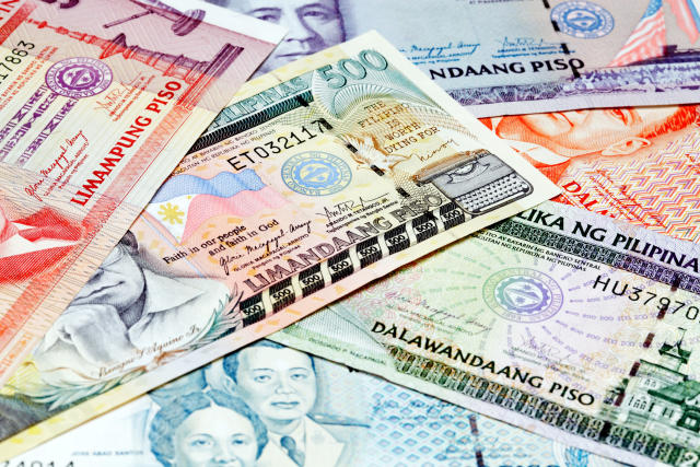 70000 philippine pesos to dollars