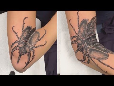 beetle tattoo elbow