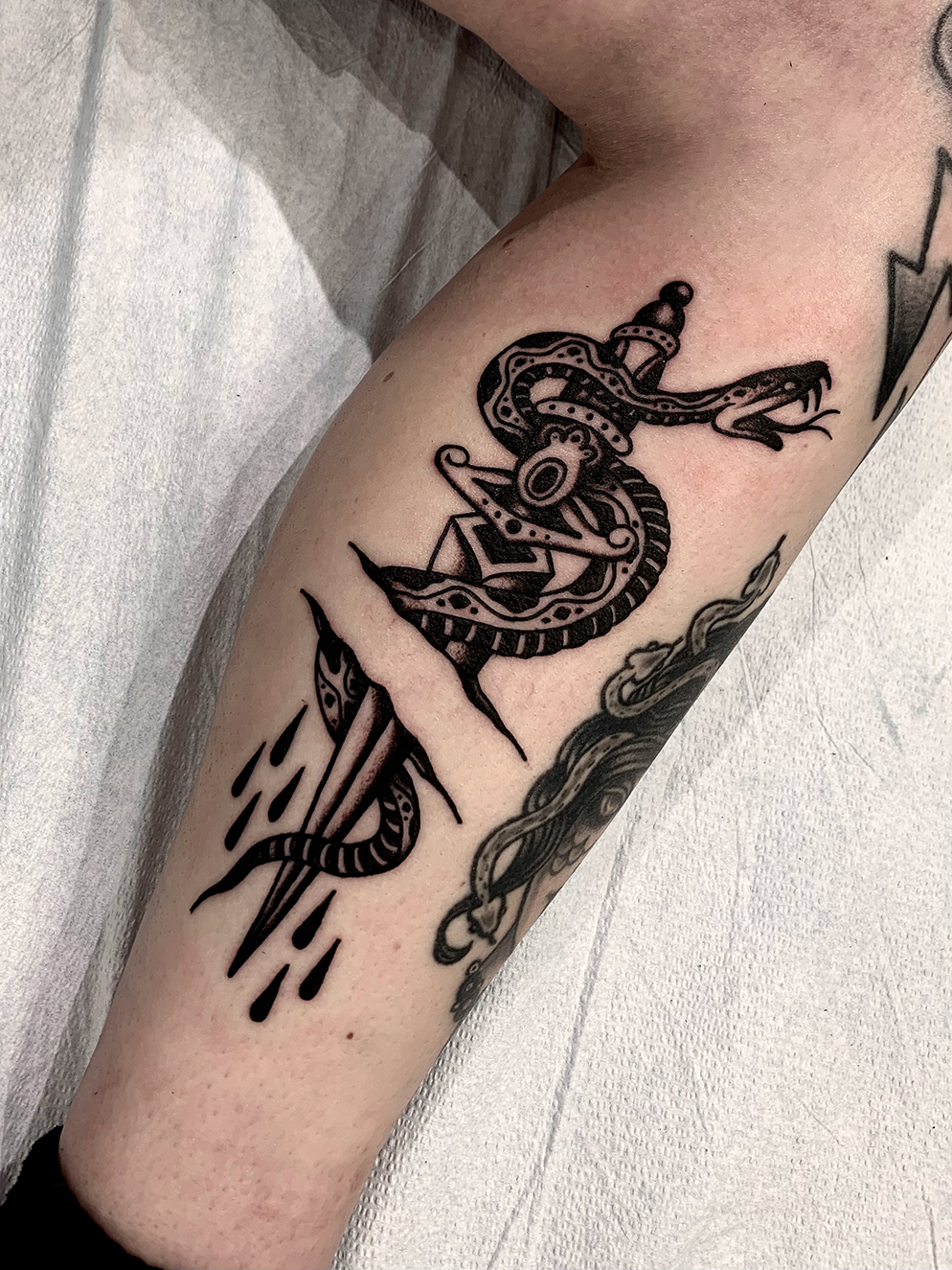 snake around dagger meaning