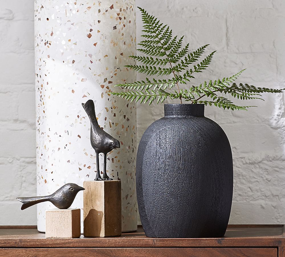 decorative birds on wooden stand