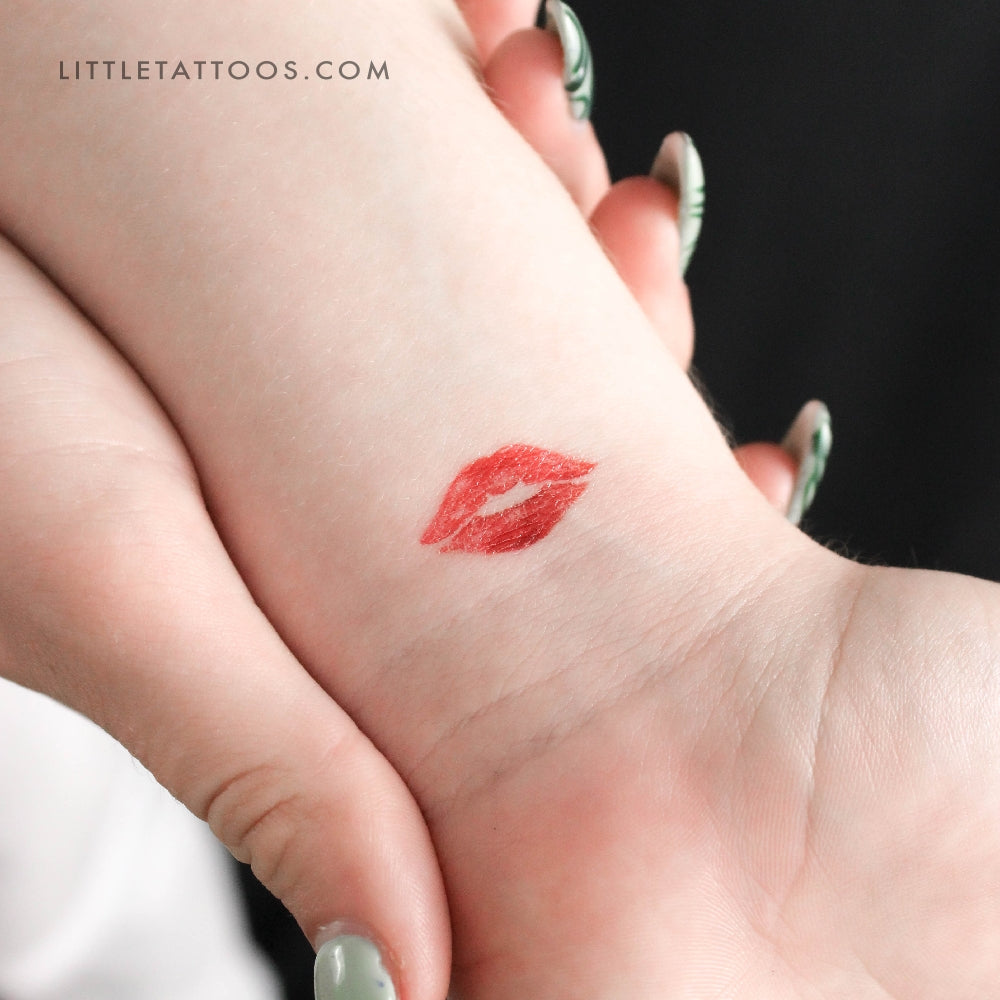 kiss mark tattoo