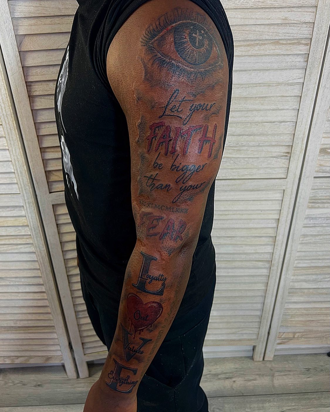 black people forearm tattoos