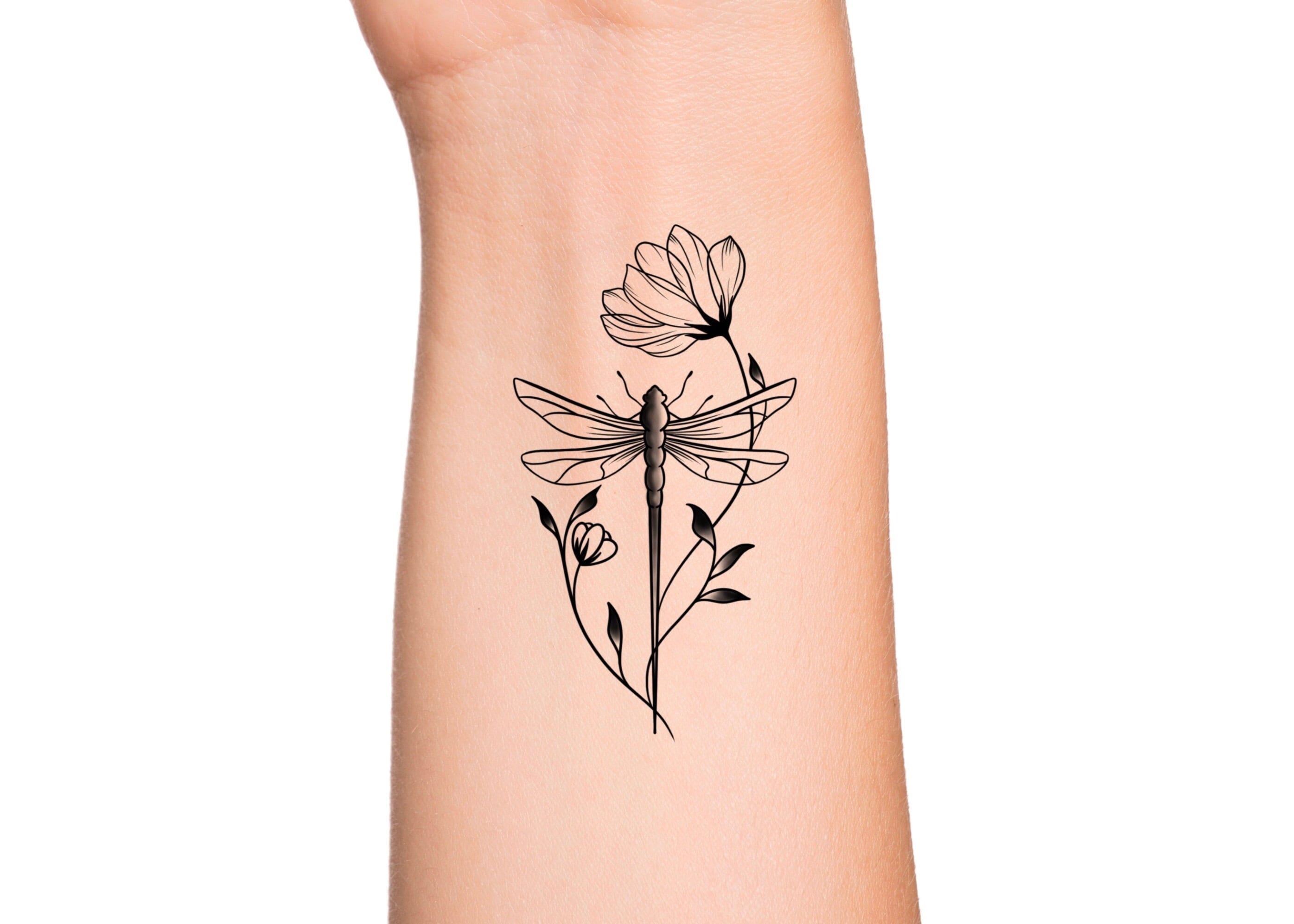 dragonfly on a flower tattoo