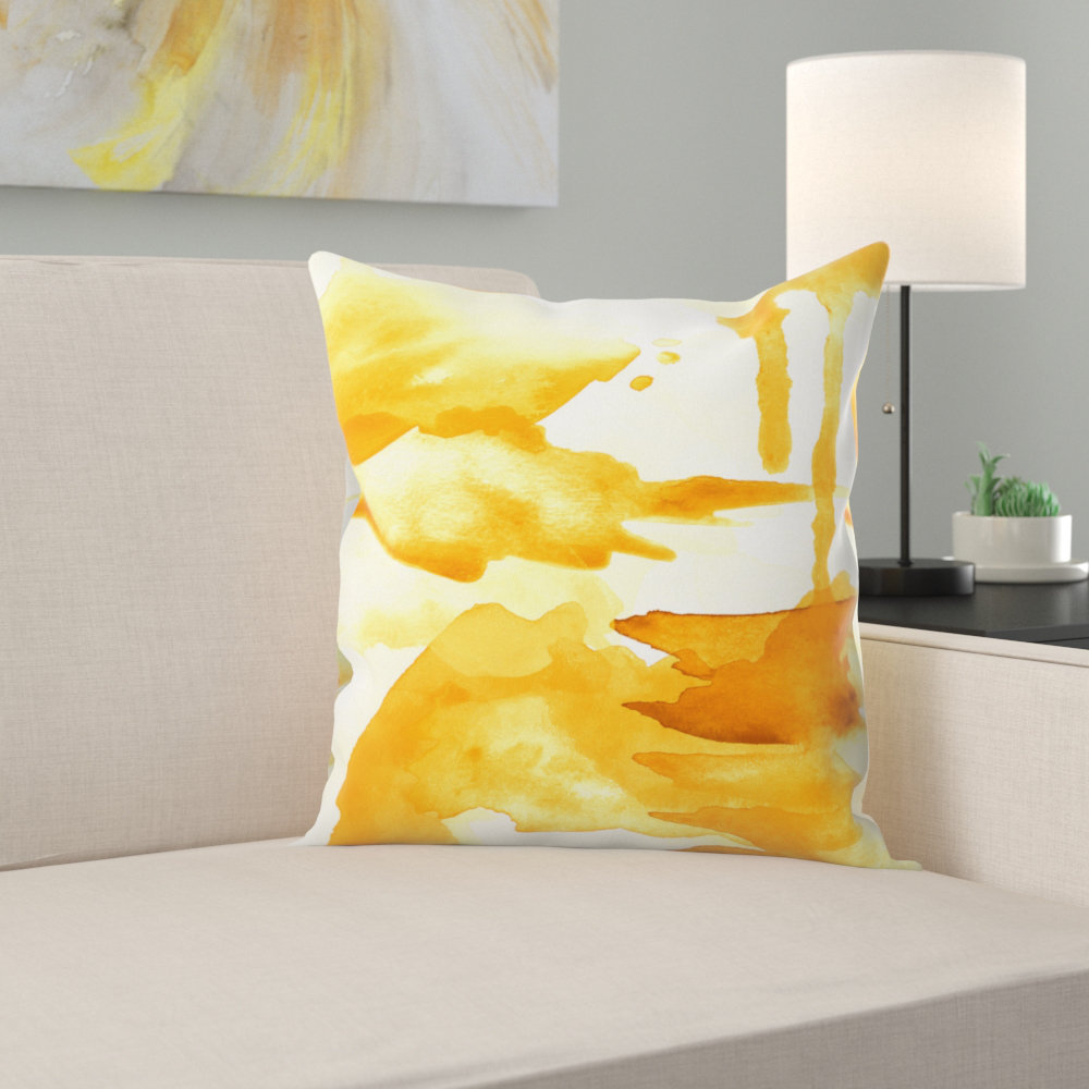 yellow pillows and throws