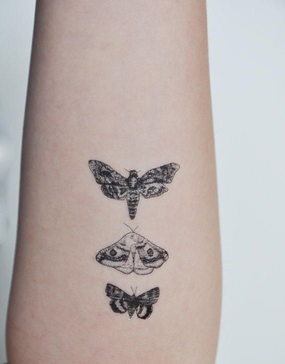 simple moth tattoo