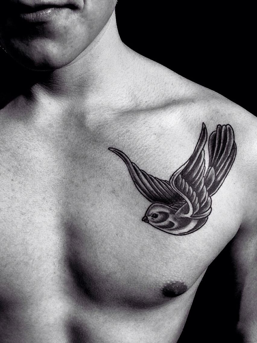 bird chest tattoo