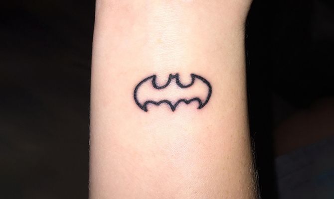small batman symbol tattoo