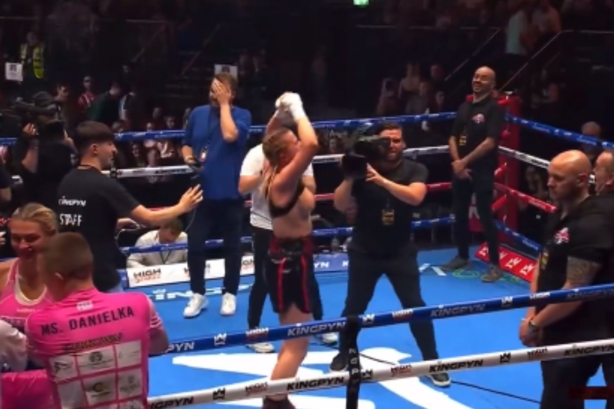 fighter flashes crowd after win