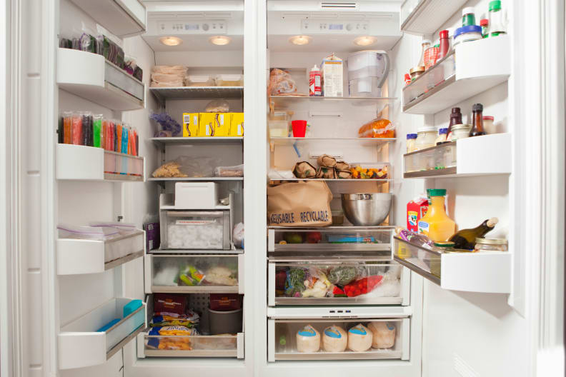 ge refrigerator freezing food