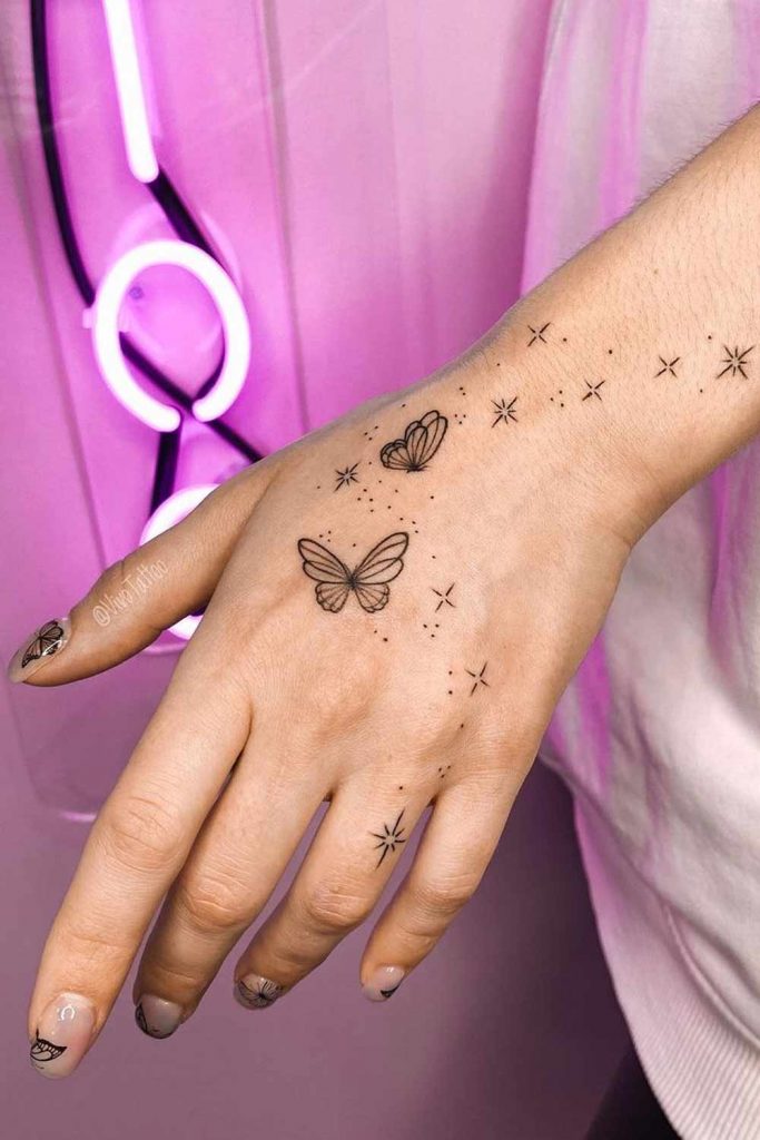 girly pretty hand tattoos