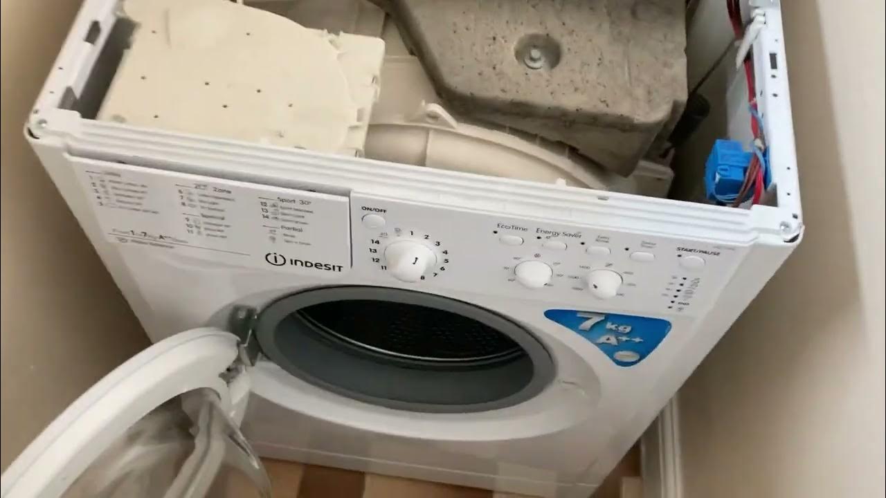 how to unlock indesit washing machine door