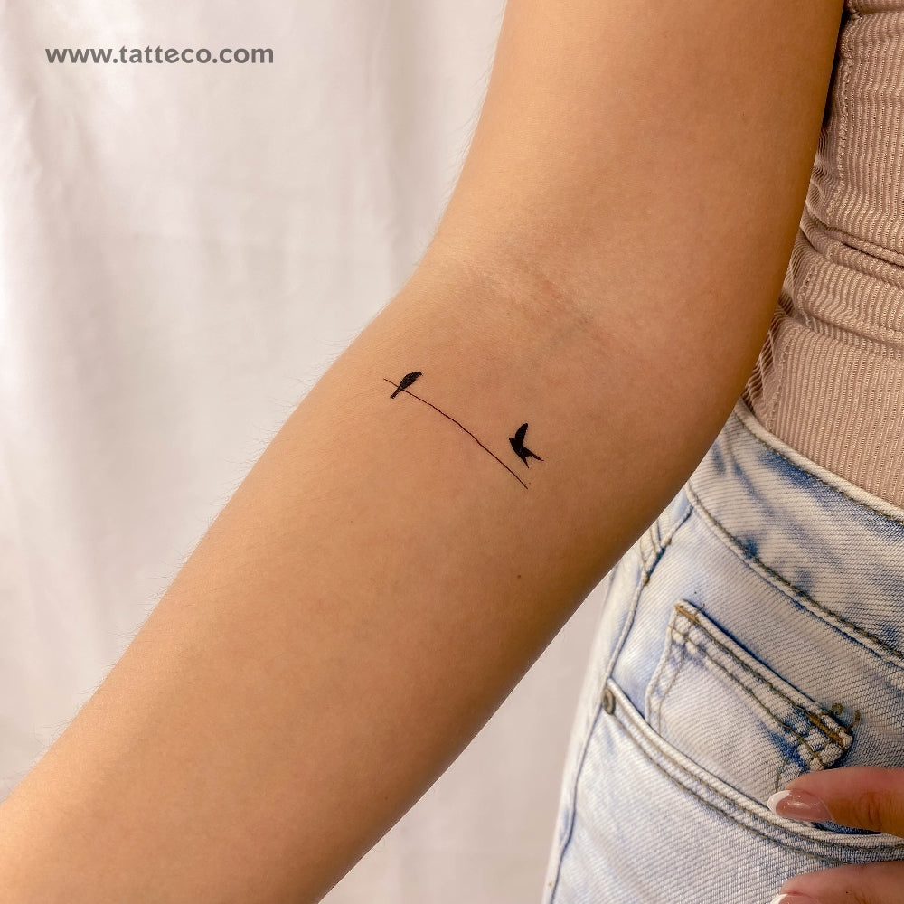 minimalist robin tattoo