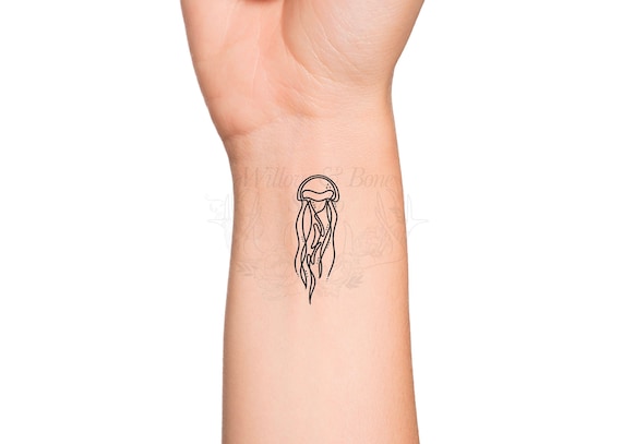 small jellyfish tattoo