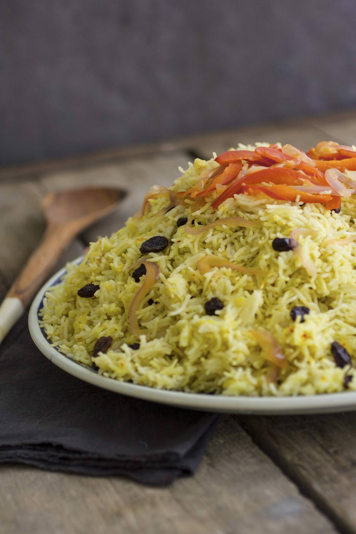 spiced rice dish crossword