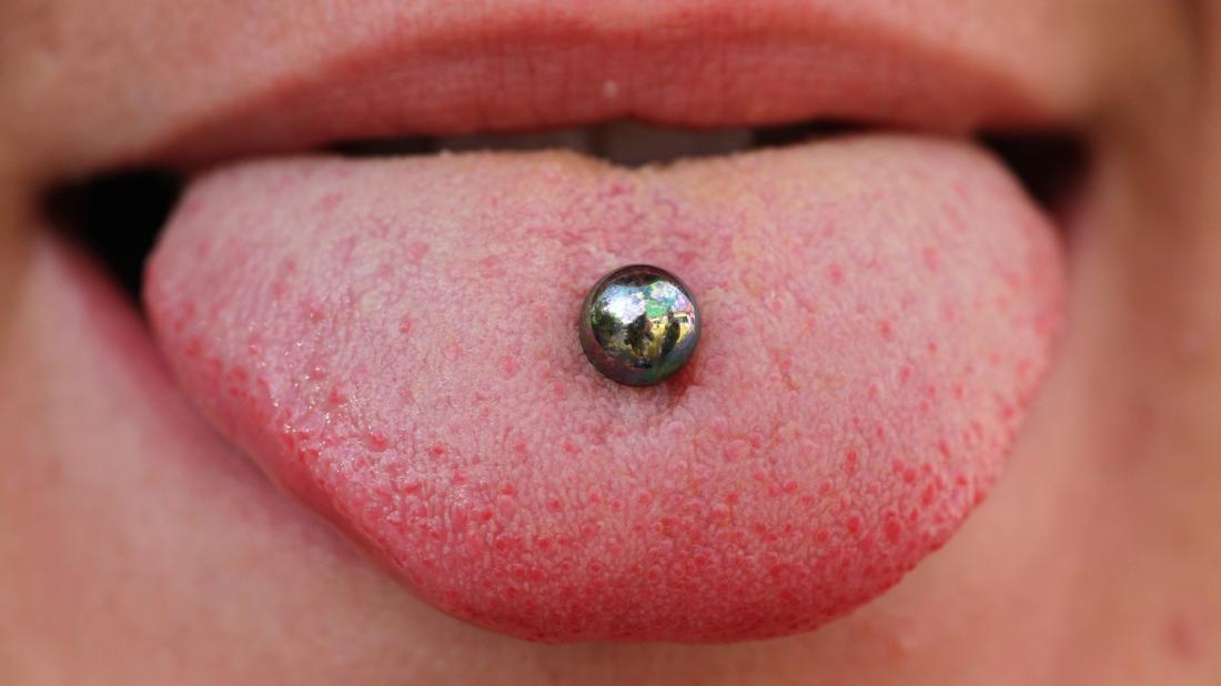 stages of tongue piercing healing