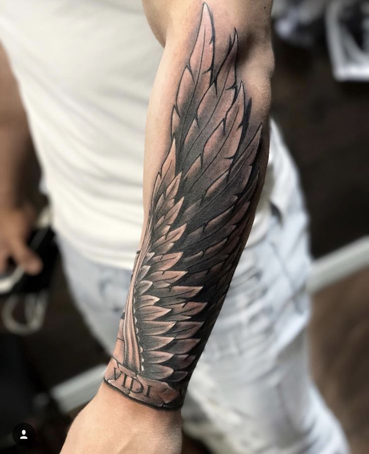 tattoo wings on arms