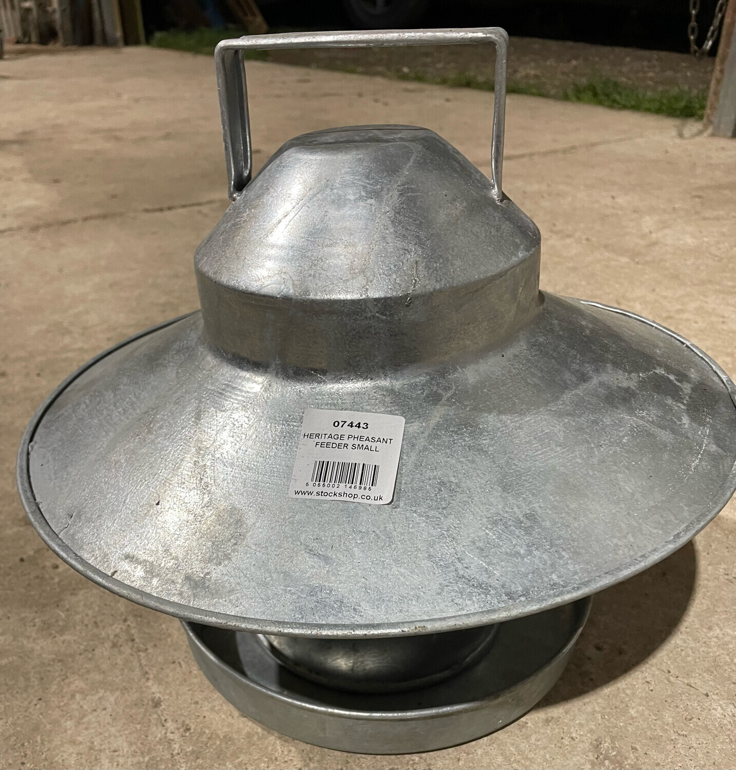 vintage galvanised chicken feeder